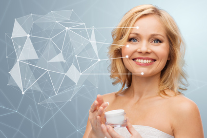 woman with moisturizer and low poly projection